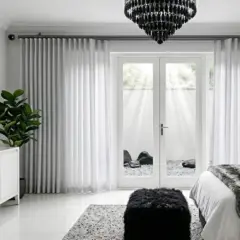Gun Metal 28Mm Double Pole Set With A Decorative Faceted Crystal Finial And Matching Hardware, Shown In A Modern Interior.