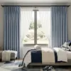 Gun metal 28mm double pole set with streamlined end caps, shown in a modern interior setting.